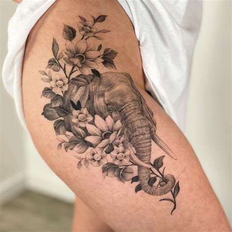 flower elephant tattoo|realistic elephant tattoo.